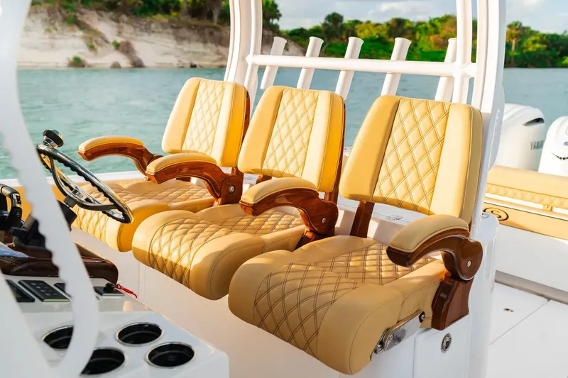 Slide: The Image of Luxurious seating on 2026 Sportsman Open 352 Center Console boat, featuring elegant design and comfort. - 13