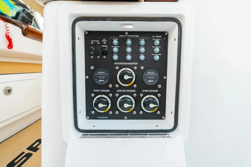 Slide: The Image of Control panel of 2026 Sportsman Open 352 Center Console boat, featuring engine and circuit controls. - 16