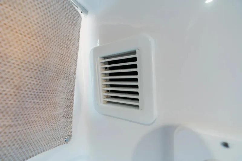 Slide: The Image of Vent detail inside 2026 Sportsman Open 352 Center Console boat. - 18