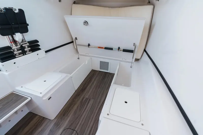 Slide: The Image of 2026 Sportsman Open 352 Center Console interior with storage compartments and modern design. - 20