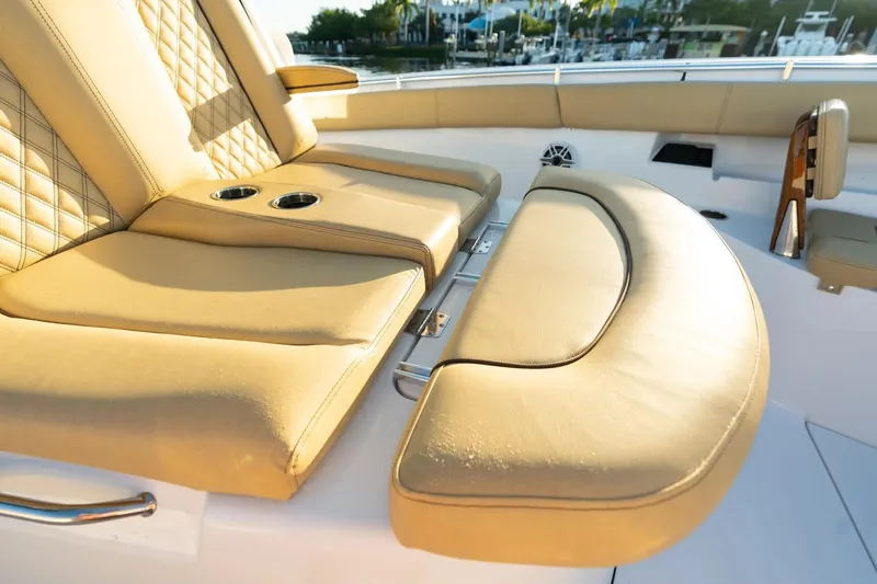 Slide: The Image of Luxurious seating on 2026 Sportsman Open 352 Center Console boat, featuring tan upholstery. - 6