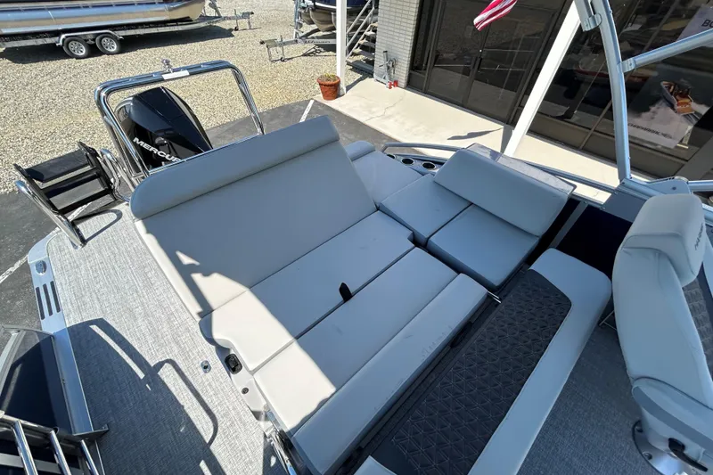 Slide: The Image of 2026 Harris FloteBote 250 Solstice SLDH pontoon boat with spacious seating and Mercury engine. - 13