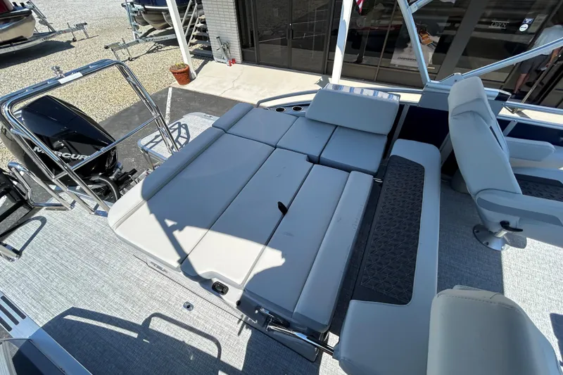 Slide: The Image of 2026 Harris FloteBote 250 Solstice SLDH pontoon boat with spacious seating and modern design. - 17