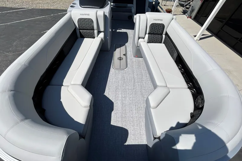 Slide: The Image of 2026 Harris FloteBote 250 Solstice SLDH pontoon boat interior with luxurious seating. - 18