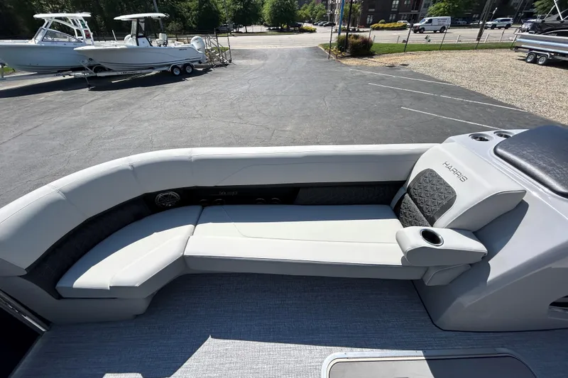 Slide: The Image of 2026 Harris FloteBote 250 Solstice SLDH pontoon boat with luxurious seating and modern design. - 21