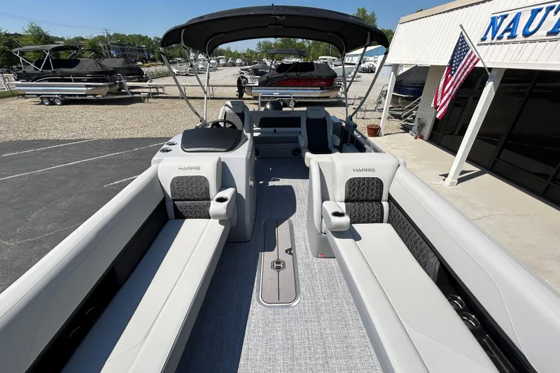 Slide: The Image of 2026 Harris FloteBote 250 Solstice SLDH pontoon boat with spacious seating and modern design. - 22