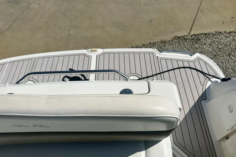 Slide: The Image of Rear view of 2006 Sea Ray 260 Sundancer boat with swim platform and railing. - 18