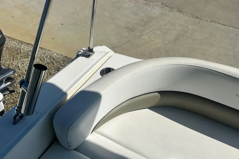 Slide: The Image of 2006 Sea Ray 260 Sundancer boat seating with stainless steel rod holder. - 19
