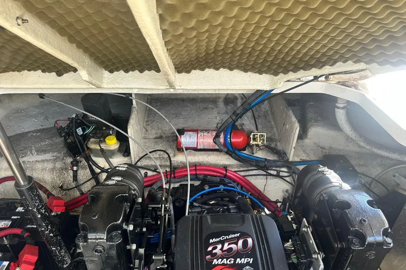 Slide: The Image of Engine compartment of a 2006 Sea Ray 260 Sundancer with MerCruiser 350 MAG MPI engine. - 25