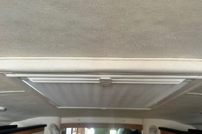 Slide: The Image of Interior ceiling view of a 2006 Sea Ray 260 Sundancer boat. - 51