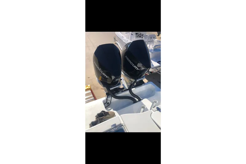 Slide: The Image of 2016 Freeman 37 VH boat cockpit with Garmin navigation system and modern controls. - 11