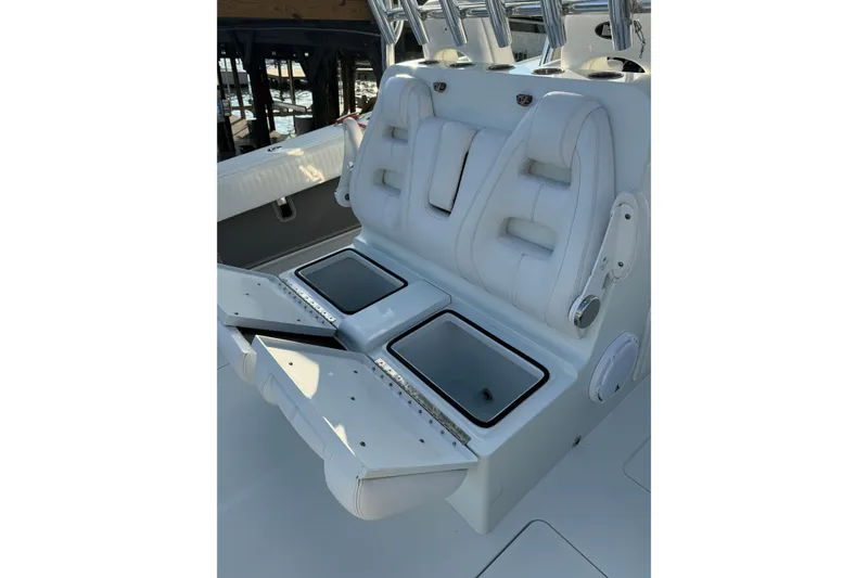 Slide: The Image of Freeman 37 VH 2016 boat seating with storage compartments and rod holders. - 15