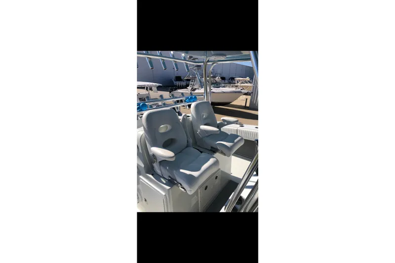 Slide: The Image of 2016 Freeman 37 VH boat deck with seating, ocean view, and clear sky. - 5