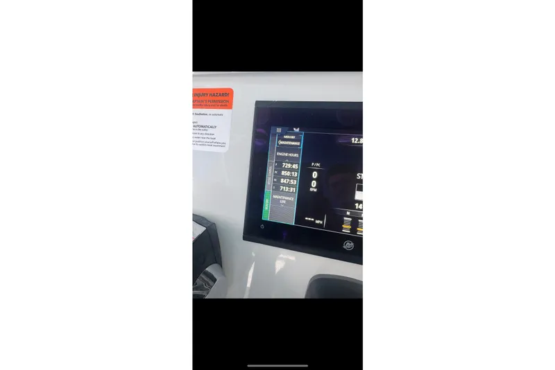 Slide: The Image of Freeman 37 VH 2016 boat docked under a partly cloudy sky. - 7