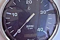 Slide: The Image of Close-up of a 2004 Mainship Pilot 34 RPM gauge displaying engine speed. - 23