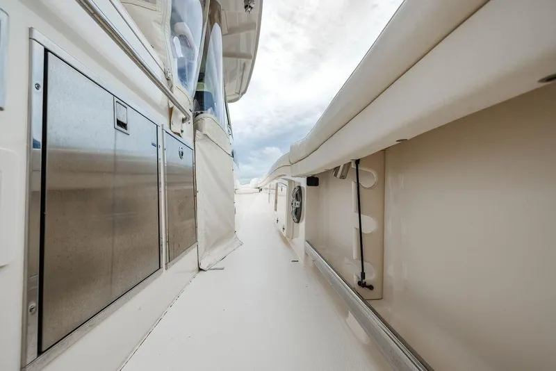 Slide: The Image of 2022 Grady-White Canyon 456 boat deck with stainless steel features and sleek design. - 17