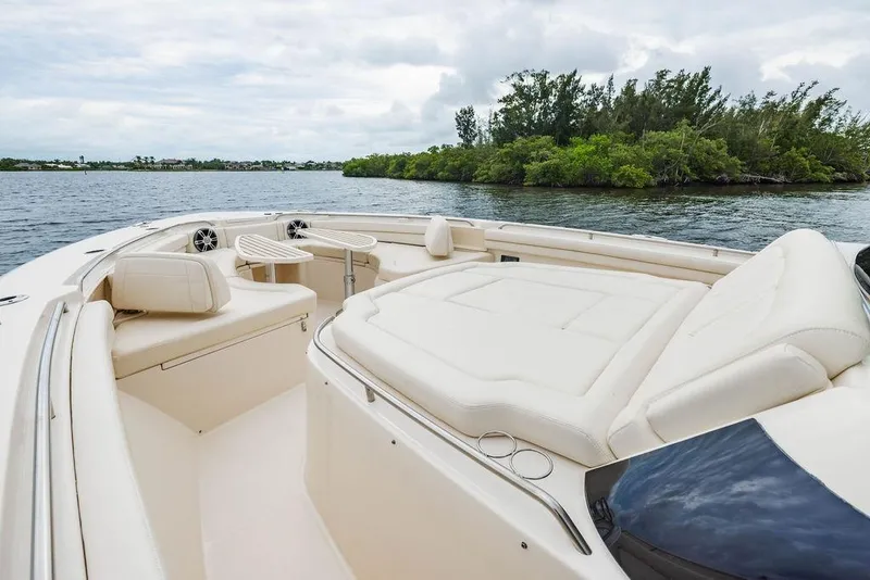 Slide: The Image of Luxurious seating on 2022 Grady-White Canyon 456 boat, with scenic water view. - 29