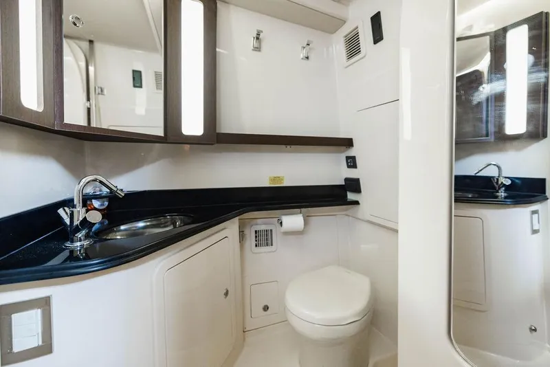 Slide: The Image of Luxurious bathroom interior of 2022 Grady-White Canyon 456 boat, featuring modern fixtures. - 41