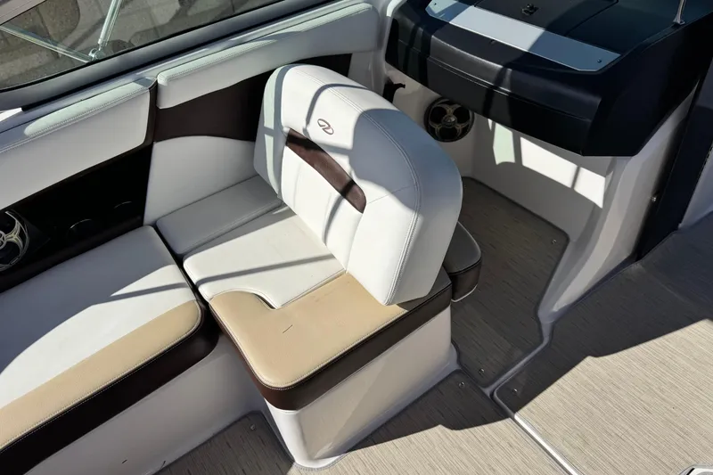 Slide: The Image of Interior of a 2016 Regal 2000 ES boat with beige and white seating. - 20