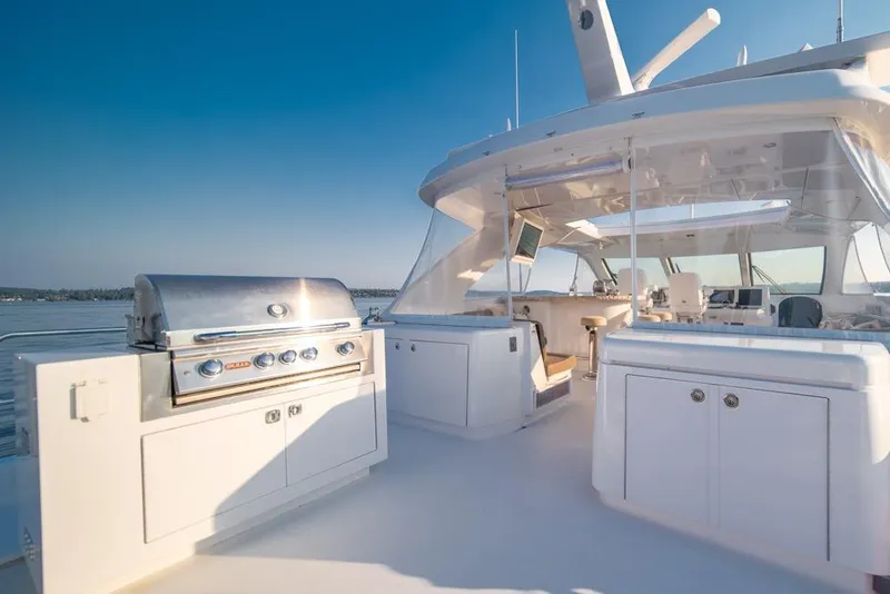 Slide: The Image of Luxurious 2008 Hatteras 72 Motor Yacht with outdoor grill and spacious deck. - 17