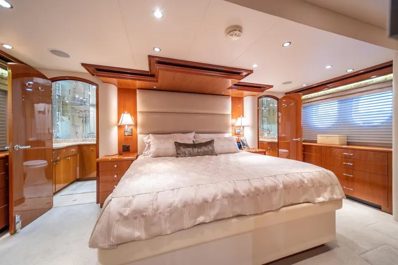 Slide: The Image of Luxurious bedroom interior of 2008 Hatteras 72 Motor Yacht with elegant wood finishes. - 37