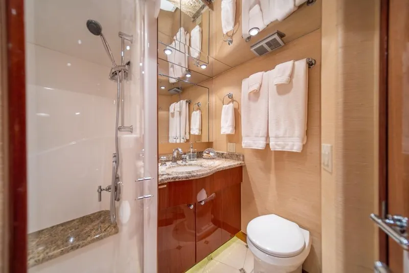 Slide: The Image of Luxurious bathroom in 2008 Hatteras 72 Motor Yacht with elegant fixtures and granite countertop. - 44