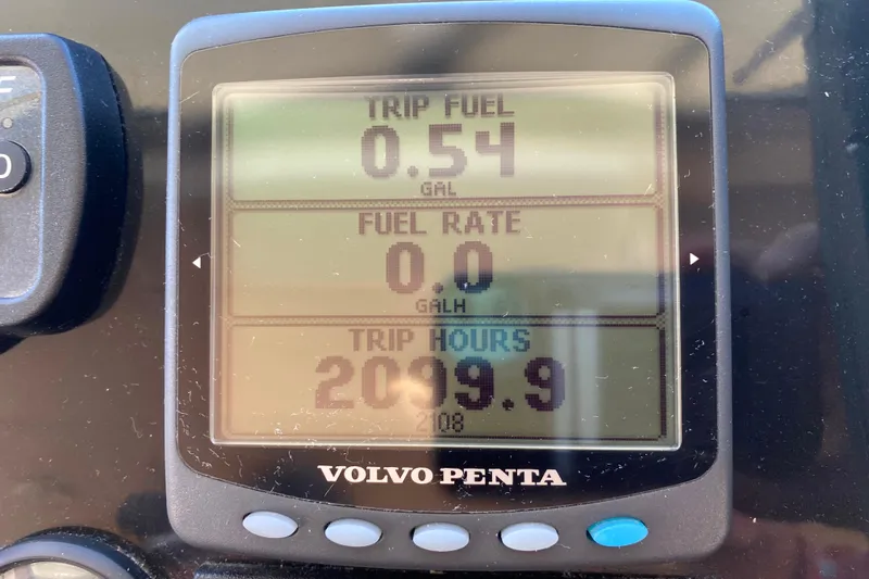 Slide: The Image of Volvo Penta display showing trip fuel, fuel rate, and trip hours for Zeta 36, 2003 model. - 37