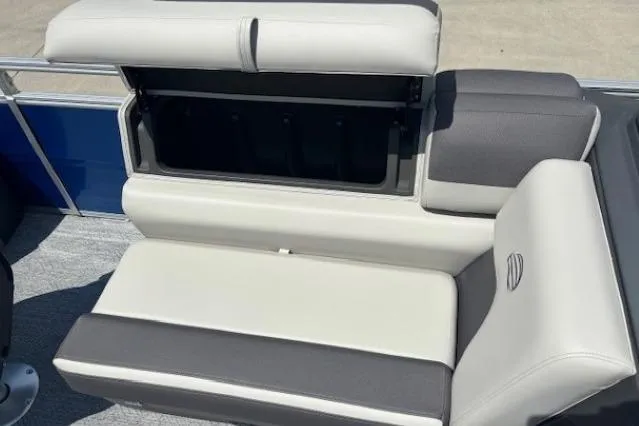 Slide: The Image of 2026 Sun Tracker Fishin' Barge 20 DLX boat seat with storage compartment open. - 11