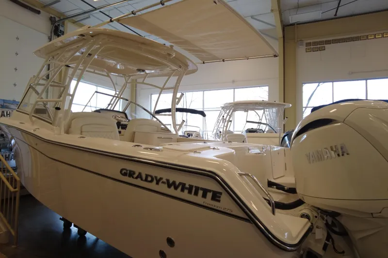Slide: The Image of 2025 Grady-White Freedom 275 boat with Yamaha engine in showroom. - 7