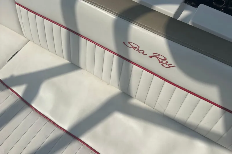 Slide: The Image of 2007 Sea Ray 230 Select boat interior with white and red upholstery. - 12