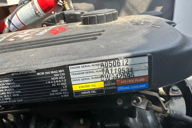 Slide: The Image of Engine compartment of a 2007 Sea Ray 230 Select with serial numbers and specifications. - 21