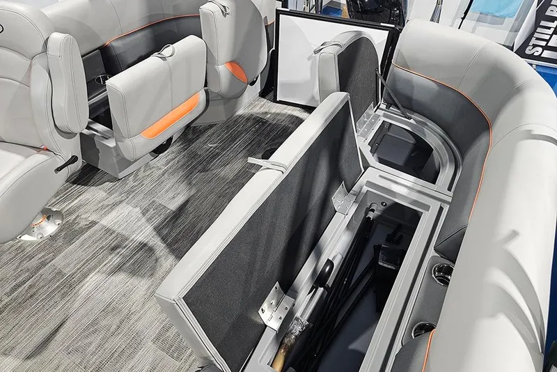 Slide: The Image of 2026 Bentley Pontoons Bolt interior with open storage compartments and modern seating design. - 14