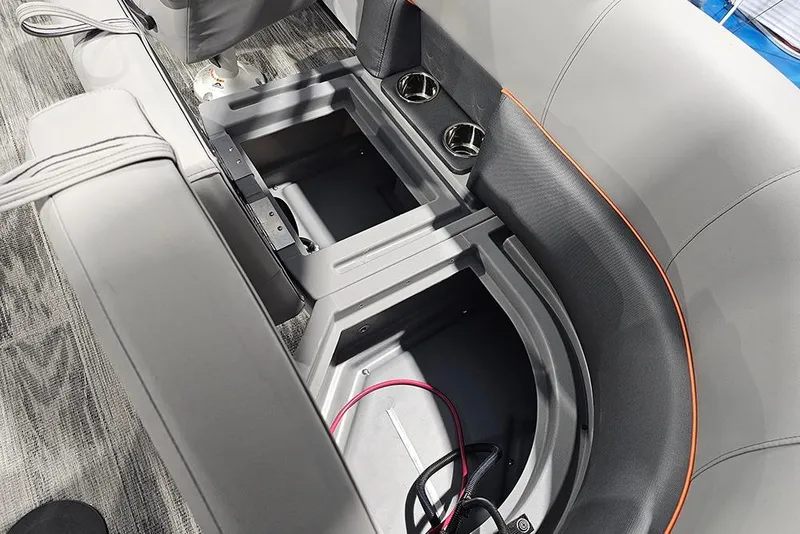 Slide: The Image of 2026 Bentley Pontoons Bolt interior storage compartment with cup holders and seating. - 15