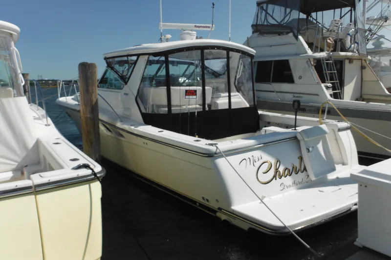 The Image of 2001 Tiara Yachts 3500 Open docked at marina, rear view. - 0