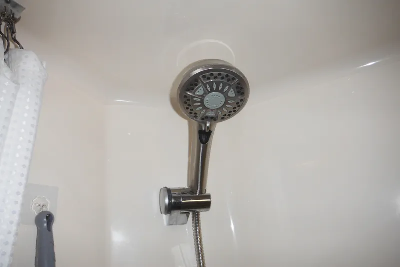 Slide: The Image of Showerhead in 2001 Tiara Yachts 3500 Open bathroom, featuring modern design and functionality. - 113