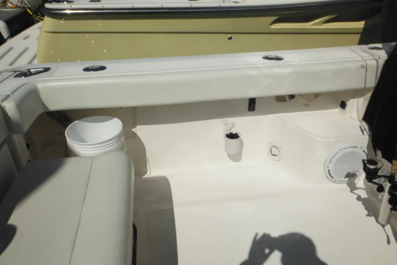 Slide: The Image of 2001 Tiara Yachts 3500 Open boat interior with seating and storage features. - 12