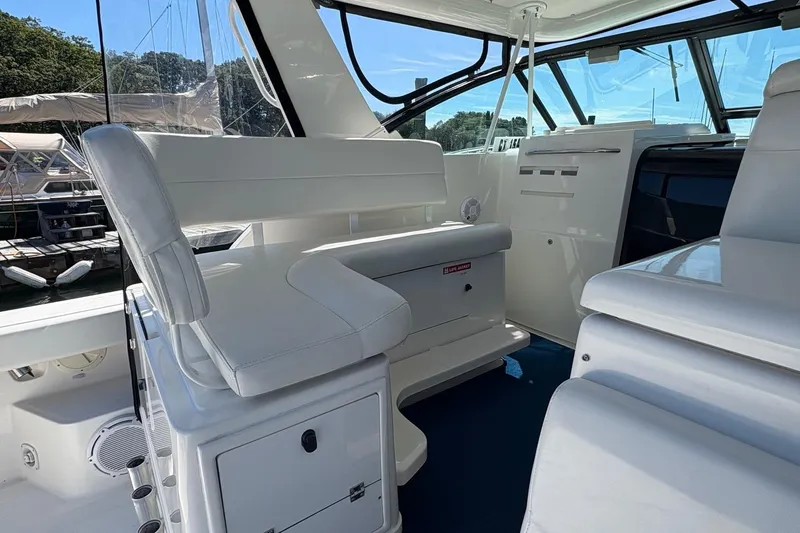 Slide: The Image of 2001 Tiara Yachts 3500 Open interior with white seating and modern design. - 121