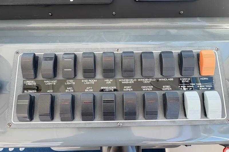 Slide: The Image of Control panel of a 2001 Tiara Yachts 3500 Open with labeled switches and buttons. - 126