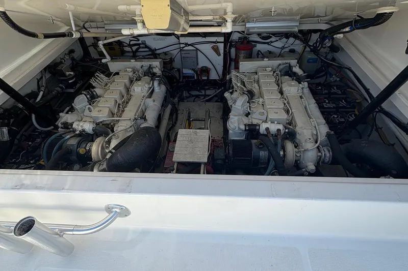 Slide: The Image of Engine compartment of a 2001 Tiara Yachts 3500 Open, showcasing dual engines. - 127
