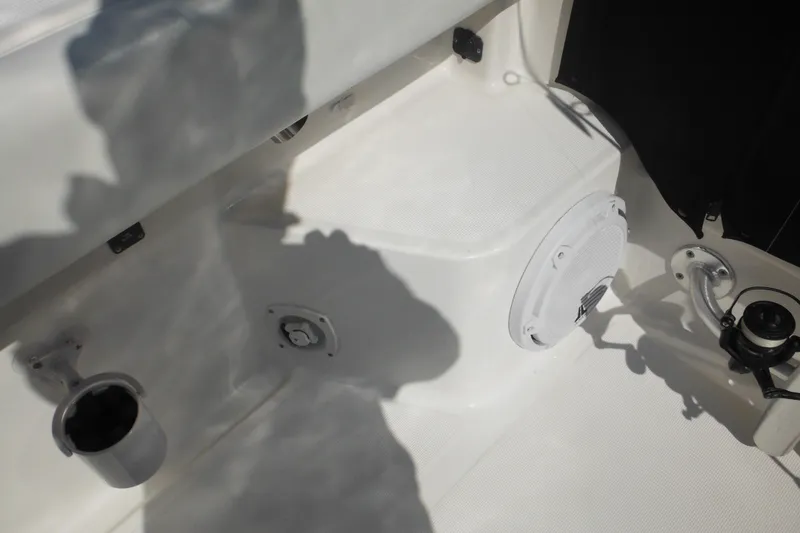 Slide: The Image of 2001 Tiara Yachts 3500 Open deck area with cup holder and speaker. - 15