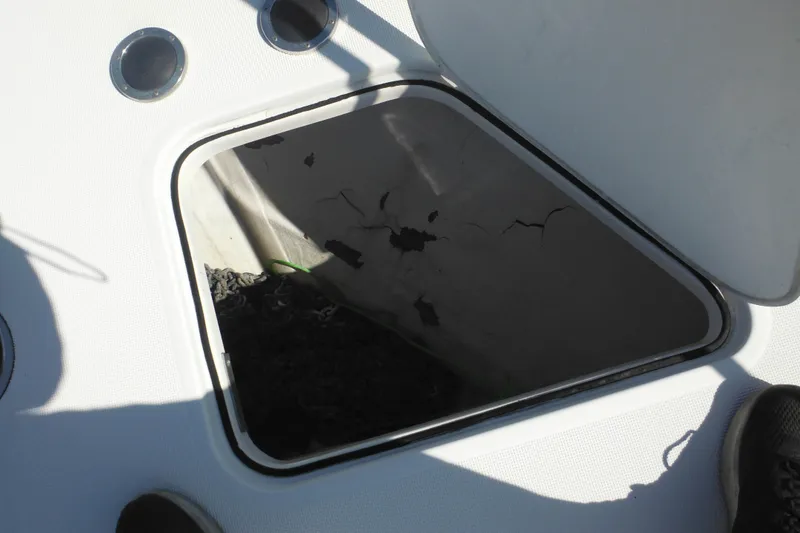 Slide: The Image of Open hatch on 2001 Tiara Yachts 3500 Open, showing interior compartment. - 33