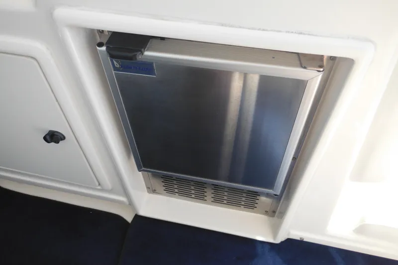 Slide: The Image of Stainless steel refrigerator on 2001 Tiara Yachts 3500 Open boat interior. - 41