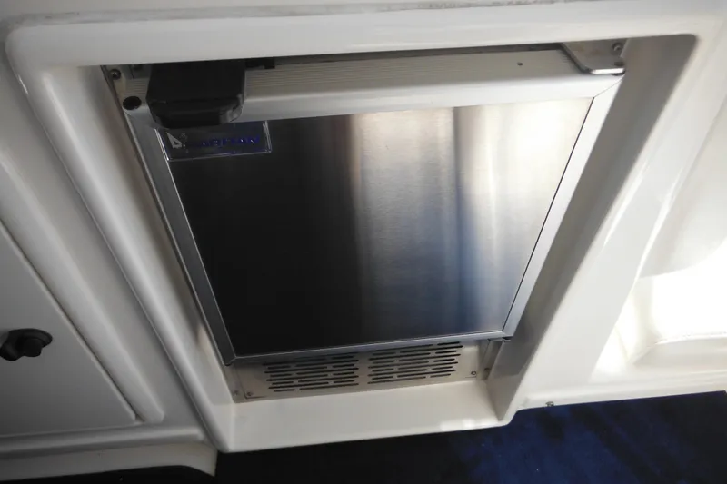 Slide: The Image of Stainless steel refrigerator on 2001 Tiara Yachts 3500 Open boat interior. - 45