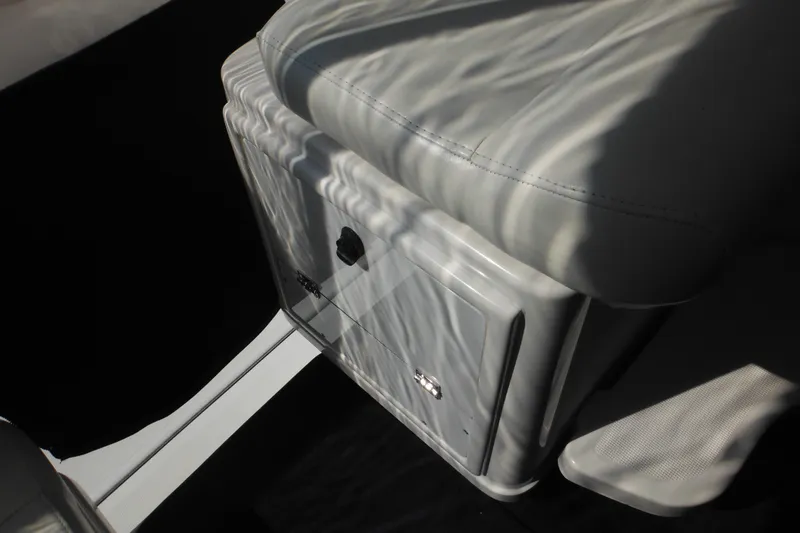 Slide: The Image of 2001 Tiara Yachts 3500 Open interior detail with seat and storage compartment. - 47