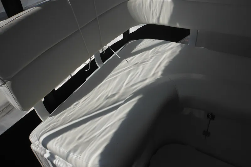 Slide: The Image of White leather seating on a 2001 Tiara Yachts 3500 Open boat. - 49