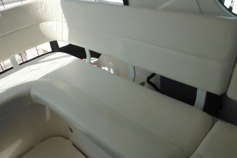 Slide: The Image of 2001 Tiara Yachts 3500 Open interior seating with white upholstery. - 54