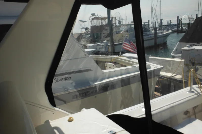 Slide: The Image of 2001 Tiara Yachts 3500 Open at marina, view from cabin window. - 59