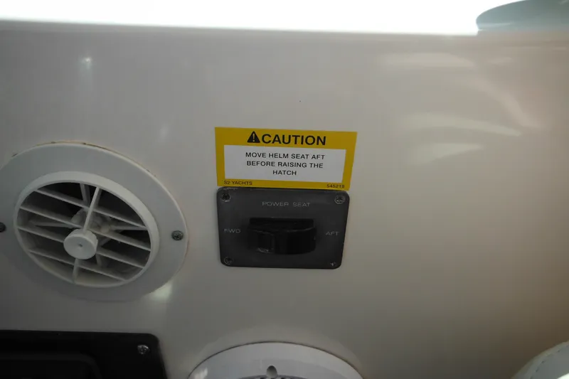 Slide: The Image of Caution label and control panel on 2001 Tiara Yachts 3500 Open boat interior. - 75