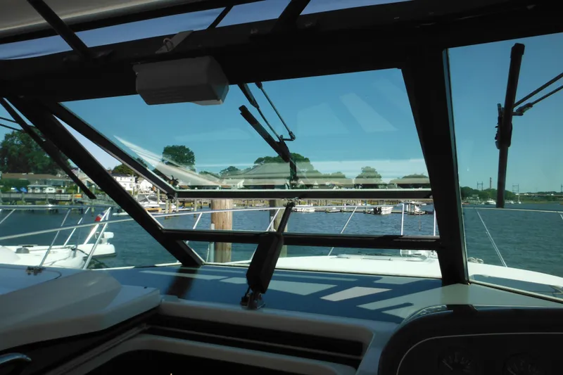 Slide: The Image of View from 2001 Tiara Yachts 3500 Open cockpit, overlooking marina and water. - 78