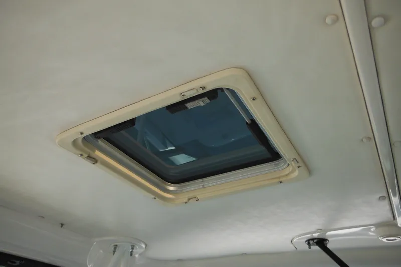 Slide: The Image of Ceiling hatch on 2001 Tiara Yachts 3500 Open, showcasing interior design details. - 82